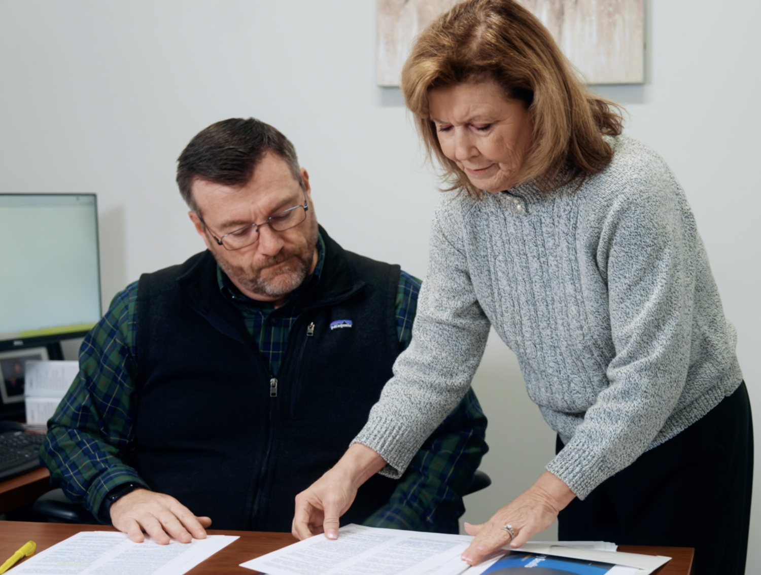HUB Team Haugen advisors reviewing policy language